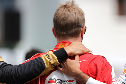 Les pilotes durant la minute de silence en hommage à Jules Bianchi : Kimi Raikkonen, Scuderia Ferrari