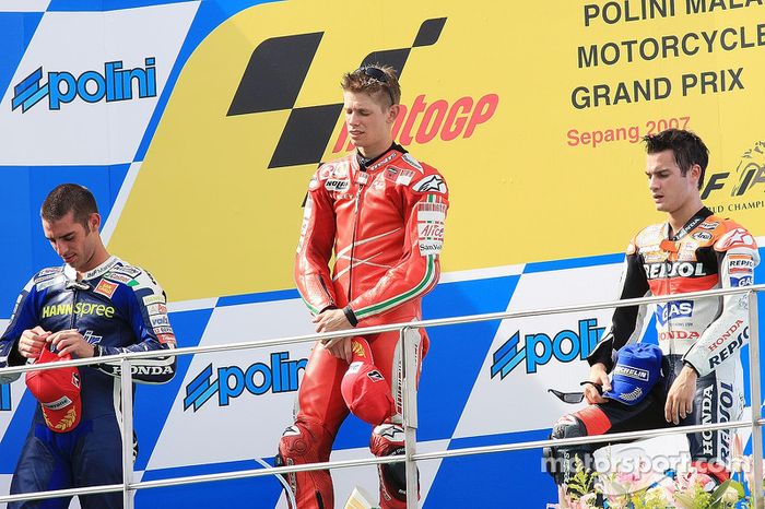 Podio: 1º Casey Stoner, 2º Marco Melandri, 3º Dani Pedrosa