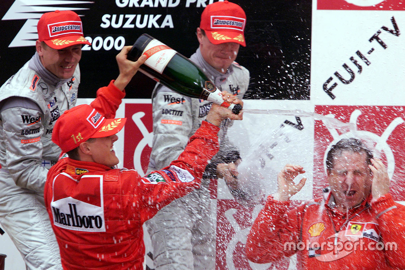 Podium: race winner and 2000 World Champion Michael Schumacher, Ferrari, second place Mika Hakkinen, McLaren, third place David Coulthard, McLaren, Jean Todt