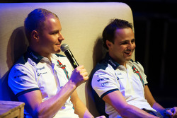 (Da sinistra a destra): Valtteri Bottas, Williams and team mate Felipe Massa, Williams al Fans' Foru
