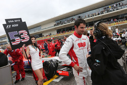 Alexander Rossi, Manor Marussia F1 Team with Jennie Gow, BBC Radio 5 Live Pitlane Reporter on the grid