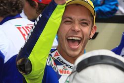 Race winner Valentino Rossi celebrates