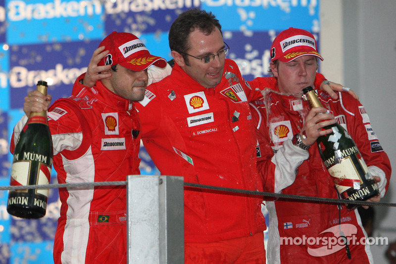 Podio: champaña para Felipe Massa, Kimi Raikkonen y Stefano Domenicali